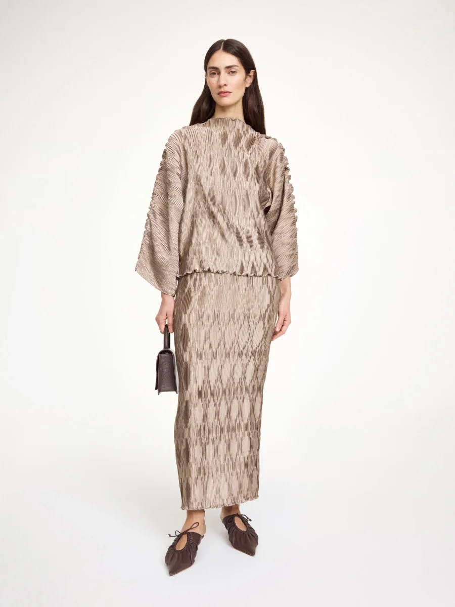 By Malene Birger Blus Tralluman